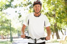 A man riding his bike, taking care of his health after 50.