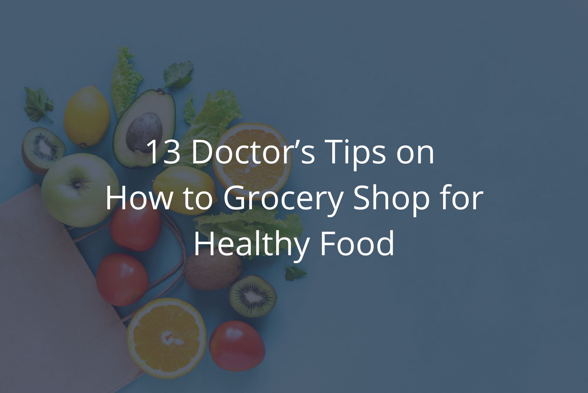 A grocery bag laying on a blue table after someone learned how to grocery shop healthy, with a dark overlay.