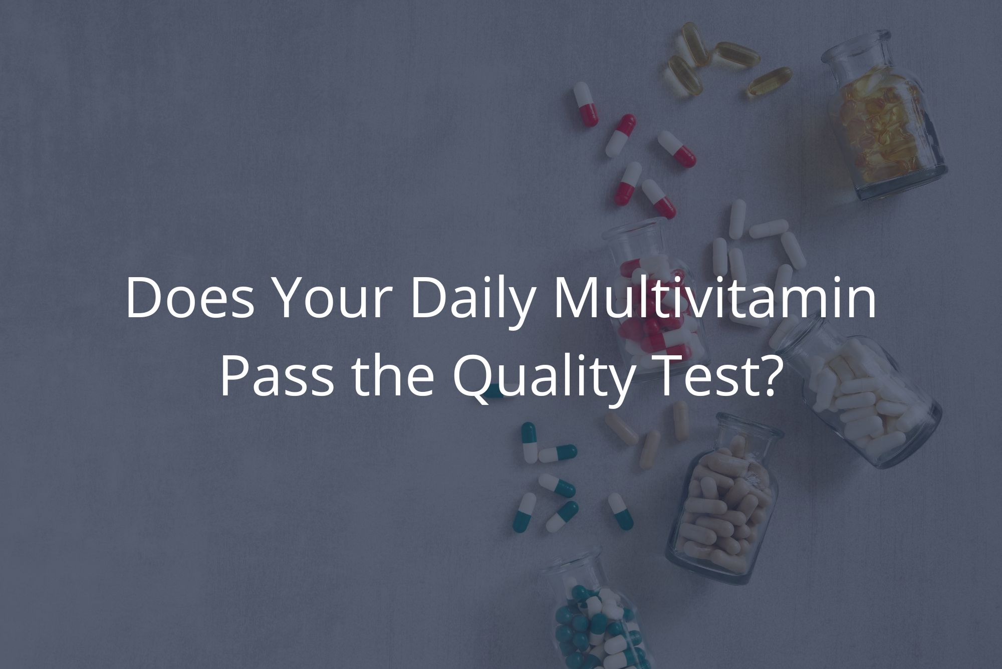 Clear bottles of daily multivitamins are tipped over, spilling colorful capsules onto a concrete surface.