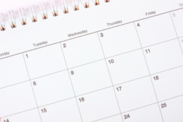 A top down view of a calendar representing yearly doctor appointments.