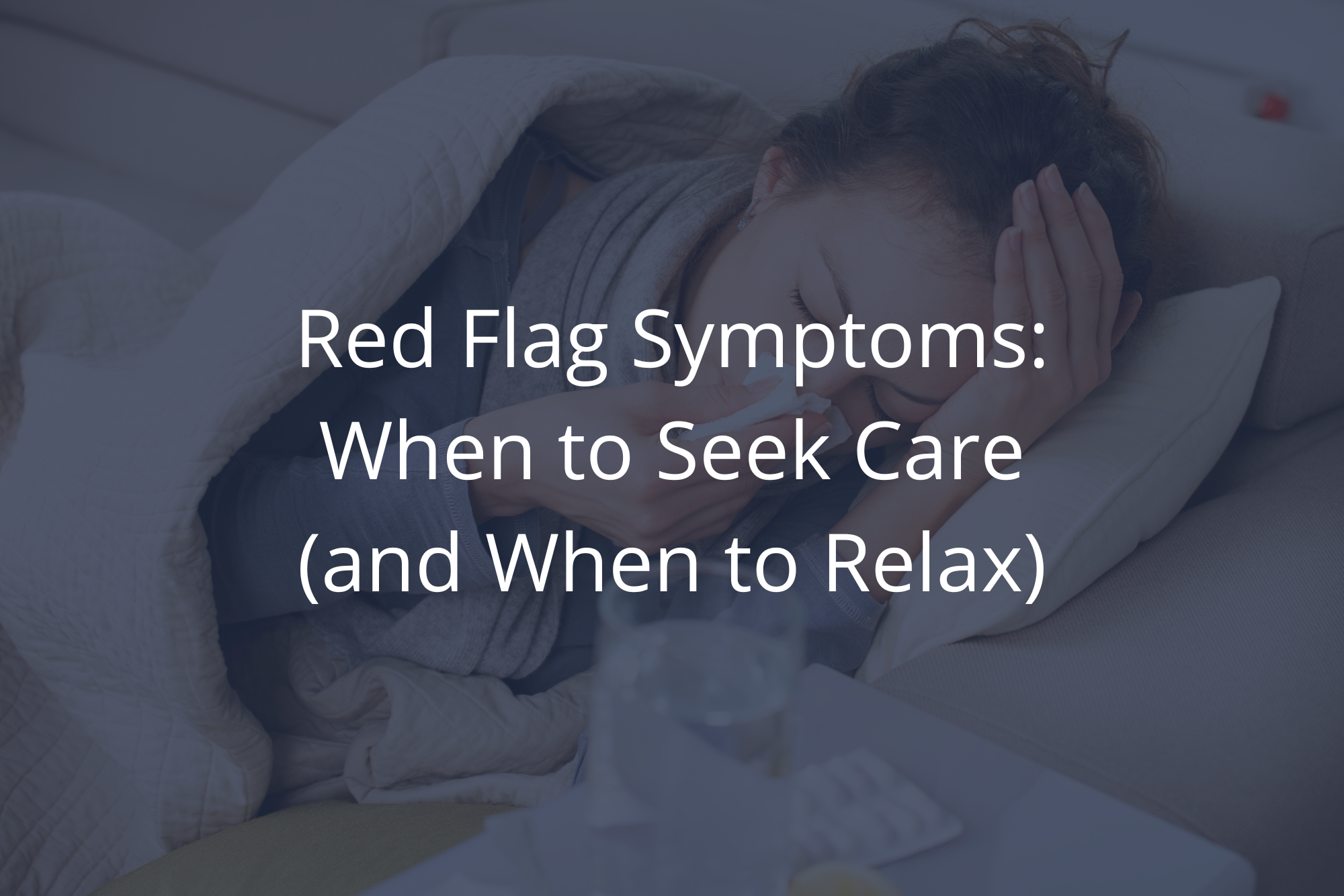 A woman lays on her couch with a high fever, blowing her nose, trying to identify her red flag symptoms, with a dark overlay.