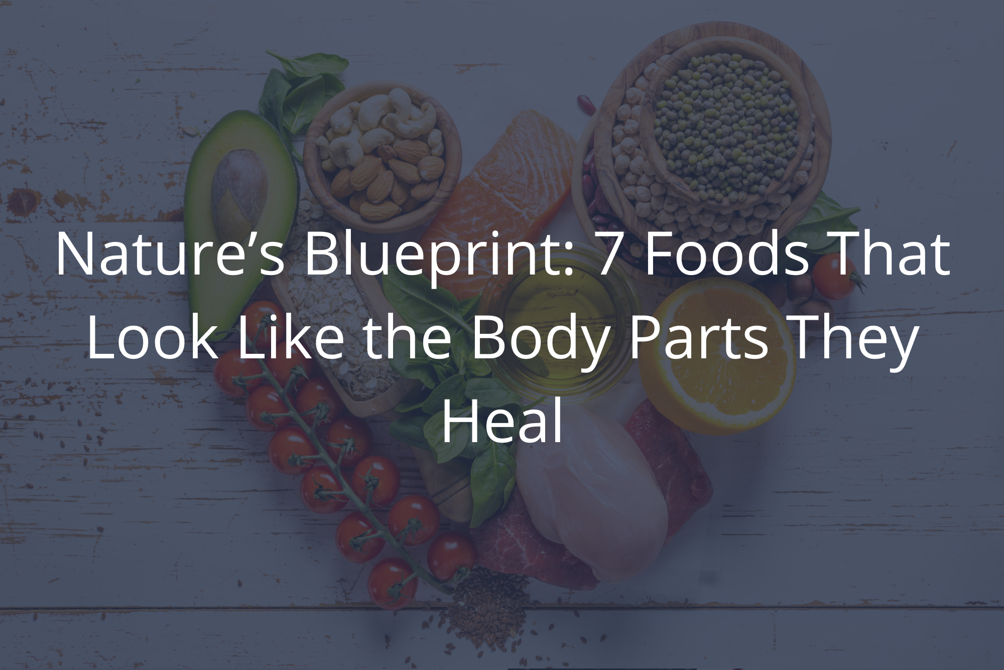 Overhead view of assorted healthy foods arranged in the shape of a heart.